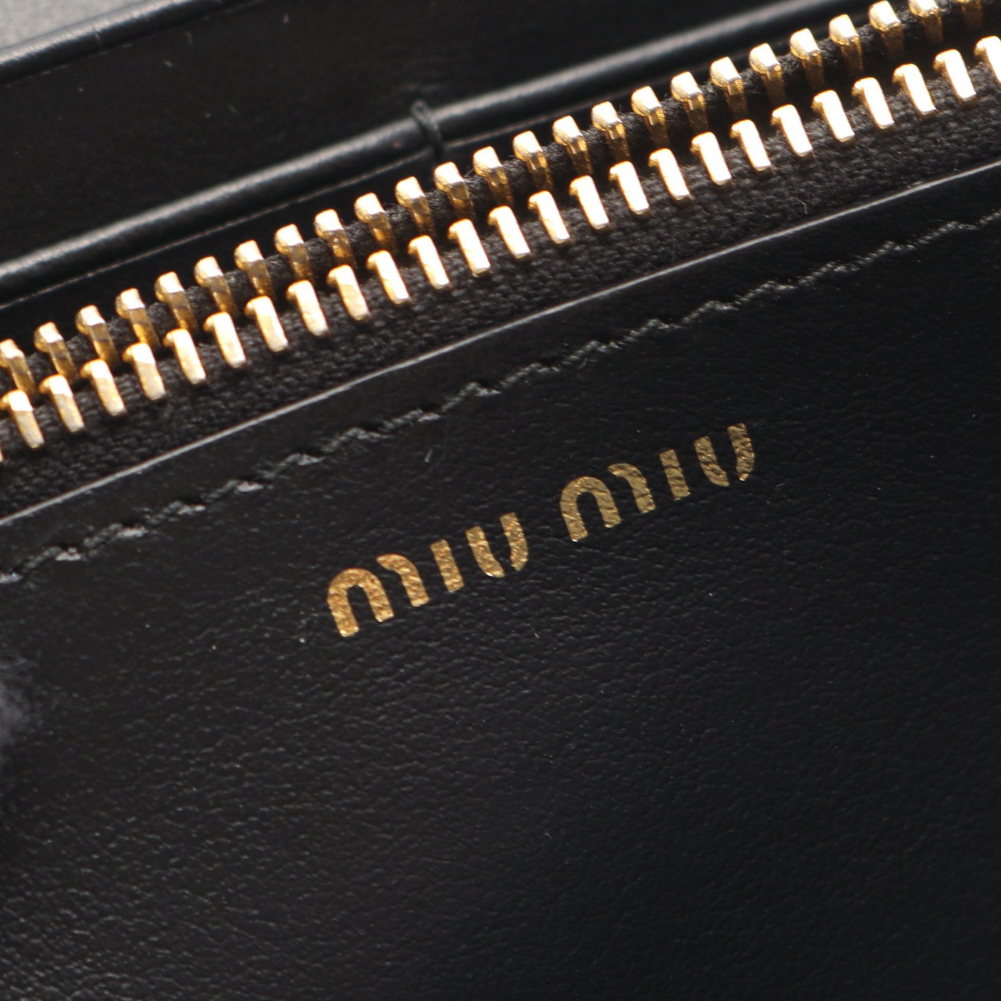 SOFT CALF BIKER 二つ折り長財布 レザー ブラック ミュウミュウ 財布・小物 miu miu