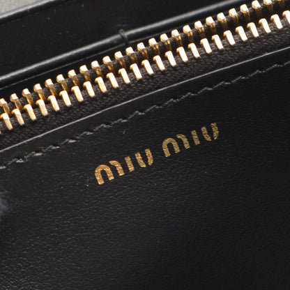 SOFT CALF BIKER 二つ折り長財布 レザー ブラック ミュウミュウ 財布・小物 miu miu