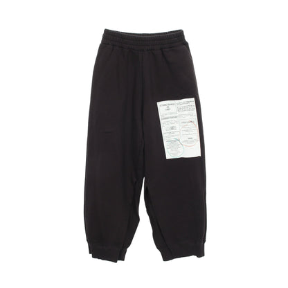 ニュースペーパープリント スリット スウェットパンツ コットン ブラック エムエムシックスメゾンマルジェラ ボトムス MM6 MAISON MARGIELA