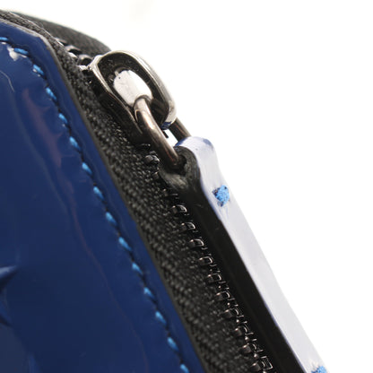 CARNABY スターエンボス ラウンドファスナー長財布 エナメルレザー ブルー ジミーチュウ