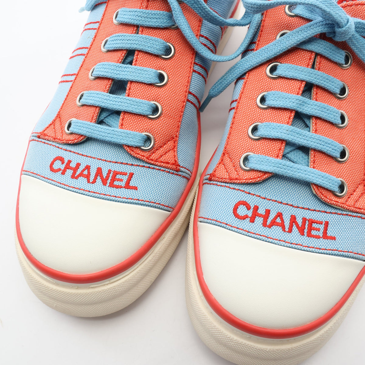 ローカットスニーカー キャンバス ライトブルー レッド シャネル シューズ CHANEL