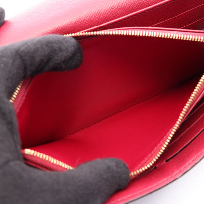 ポルトフォイユサラ モノグラム フューシャ 二つ折り長財布 PVC ブラウン ピンクパープル ルイヴィトン