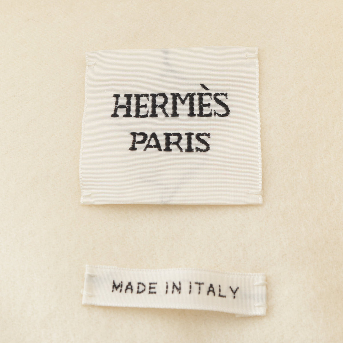 セリエボタン ロング ベスト カシミヤ オフホワイト エルメス トップス HERMES