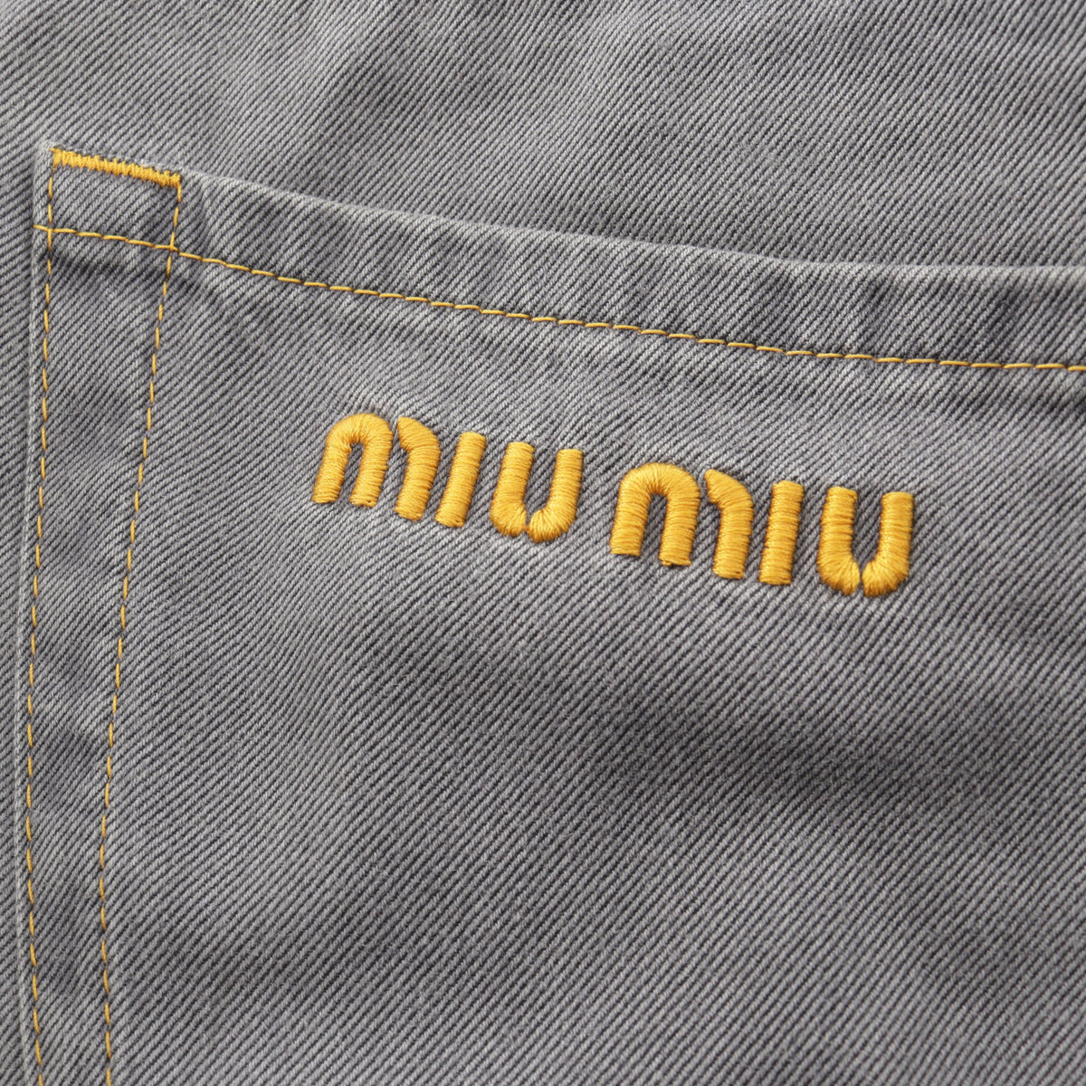 シャンブレージーンズ デニムパンツ コットン グレー ミュウミュウ ボトムス miu miu