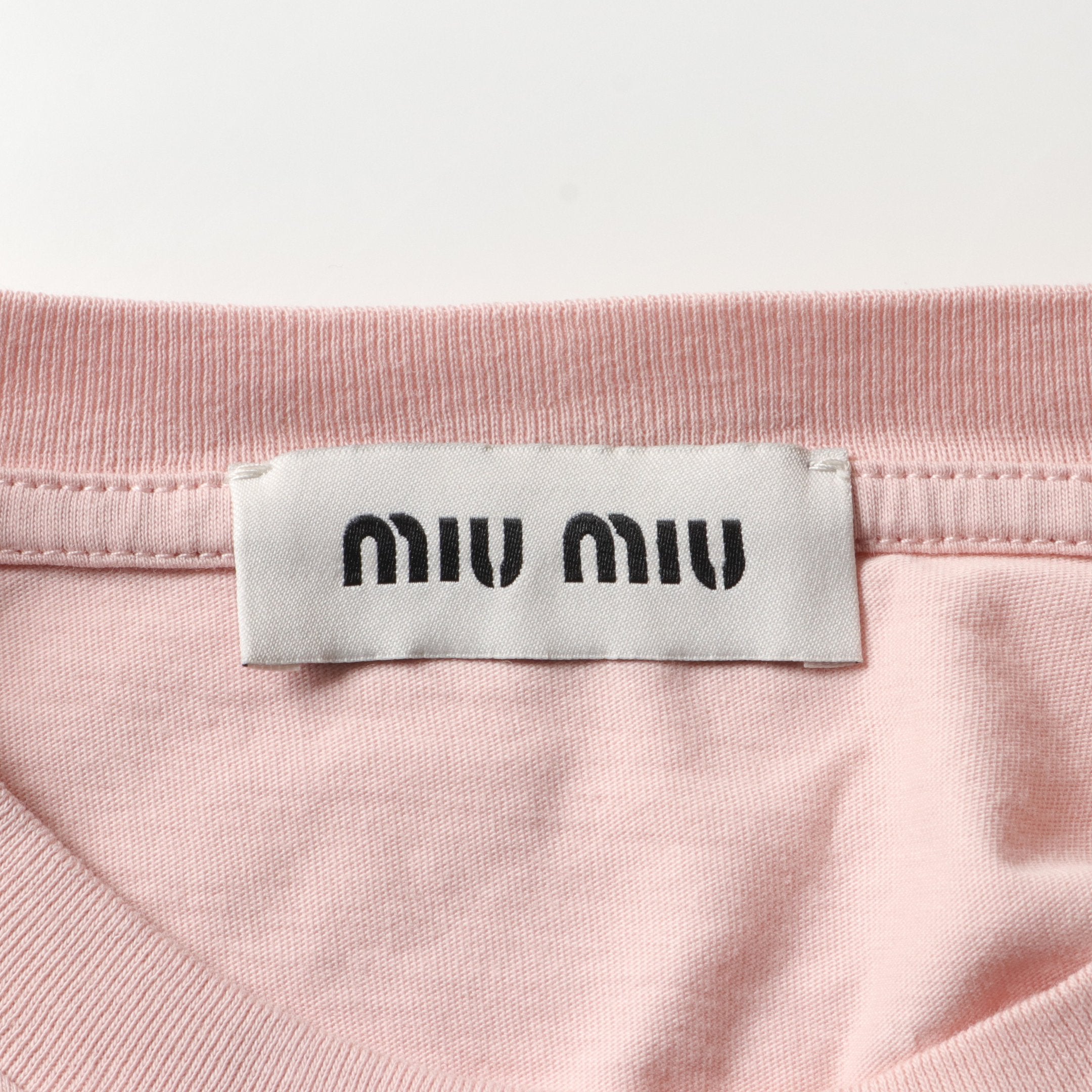 MIU MIU ピンク 長袖 Tシャツ ロング Tシャツ 長袖 ロゴワッペン コットン ライトピンク ミュウ