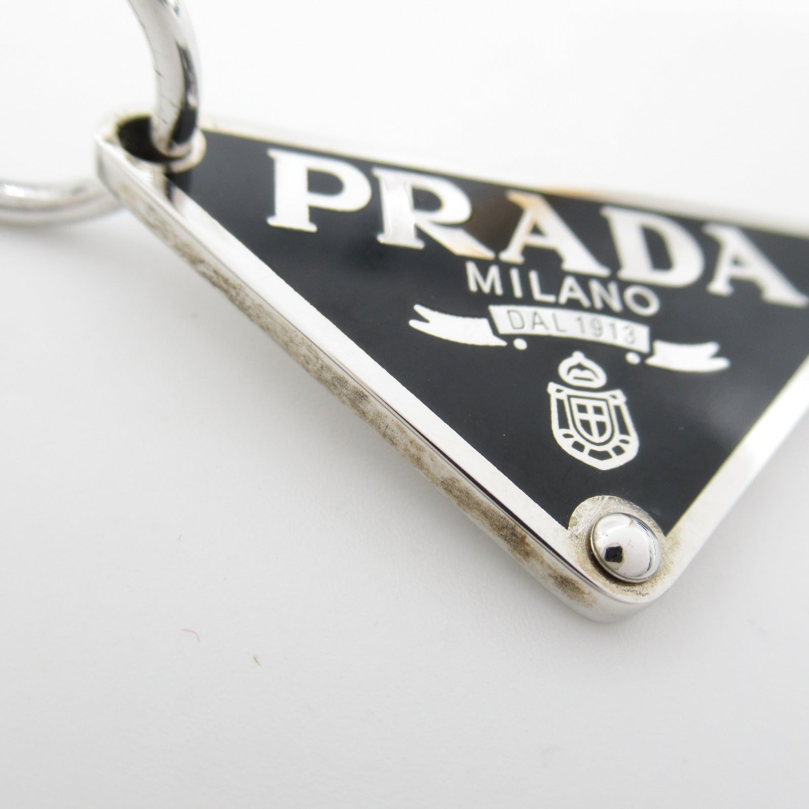 シンボル 右耳用ペンダントピアス ピアス その他 メッキ シルバー ブラック プラダ アクセサリー PRADA