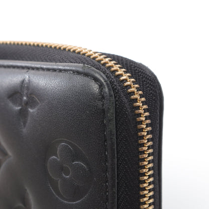 ジッピーウォレット クッサン モノグラム ラウンドファスナー長財布  