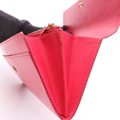 ポルト モネ クレディ モノグラムヴェルニ フューシャ 二つ折り長財布  