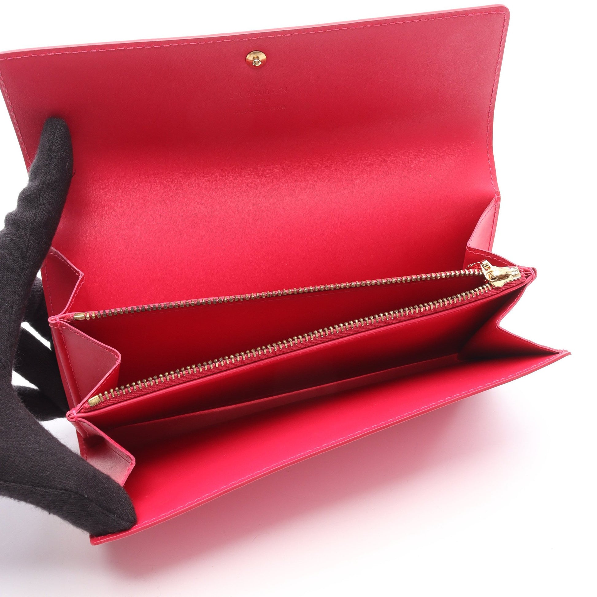 ポルト モネ クレディ モノグラムヴェルニ フューシャ 二つ折り長財布  