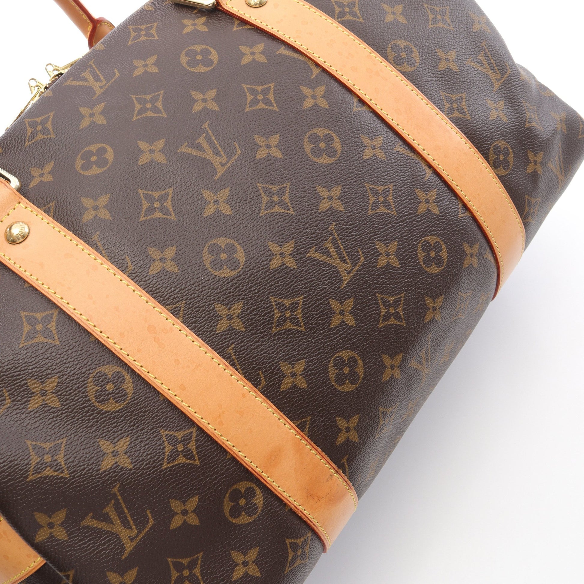 キャリーオール モノグラム ボストンバッグ PVC レザー ブラウン ルイヴィトン バッグ LOUIS VUITTON